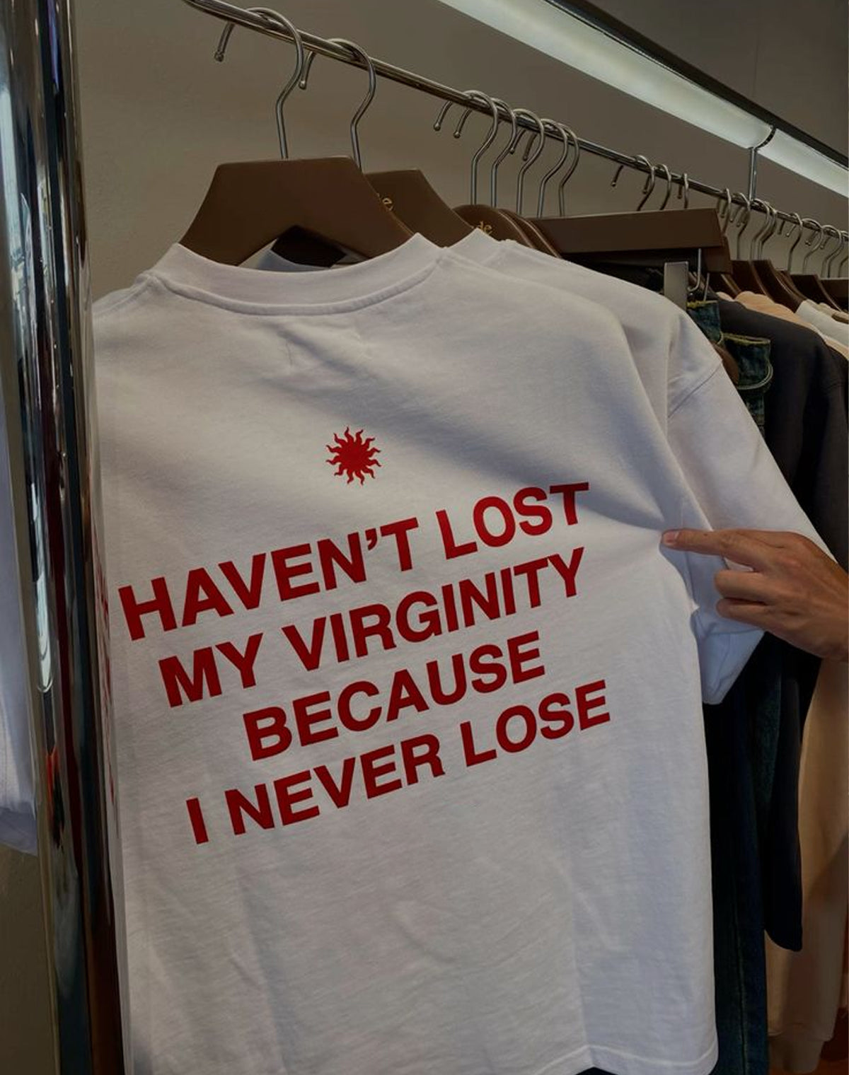 Trendy Women’s White Graphic Tee – “Haven’t Lost My Virginity Because I Never Lose” Funny Statement Shirt